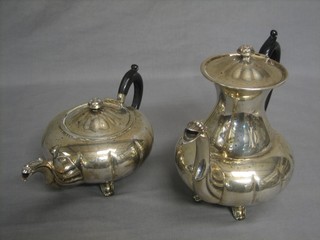 A silver plated coffee pot and teapot