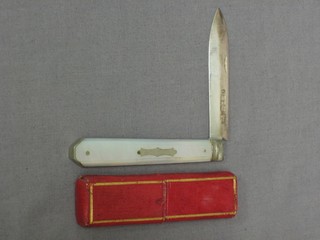 A Victorian silver bladed folding fruit knife with mother of pearl grip Sheffield 1868 with leather case