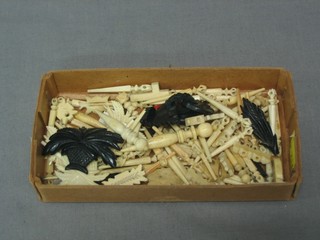 A collection of miniature ivory items