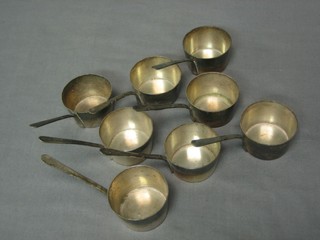 8 silver plated brandy warmers in the form of saucepans