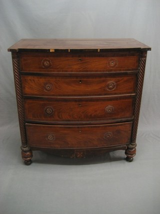 A William IV mahogany bow front chest of 4 long drawers with spiral turned column to the sides 40" (split to top and no handles)
