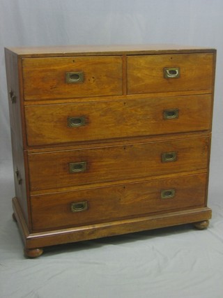 A 19th Century camphor military chest of 2 short and 3 long drawers, with brass carrying handles to the sides, raised on bun feet 41"
