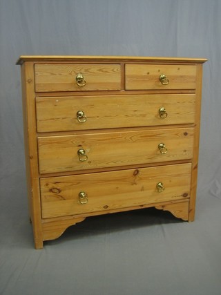 A pine chest of 2 short and 3 long drawers, raised on bracket feet 41"