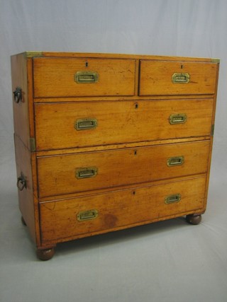 A 19th Century camphor and brass banded military chest of 2 short and 3 long drawers, with iron carrying handles to the sides (in 2 sections) 39"