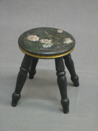 A 19th Century black painted 4 legged stool with floral decoration 9"