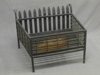 A large iron fire grate 26"