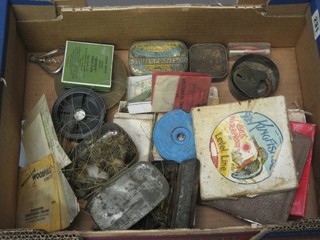 A box containing various flys, line, etc