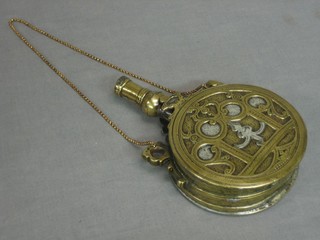 An Eastern circular brass powder flask 6"