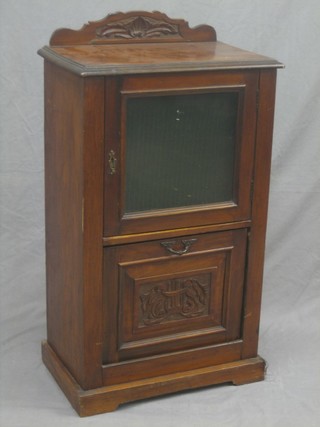 A Victorian walnut music cabinet, the base incorporating a purdonium 21"