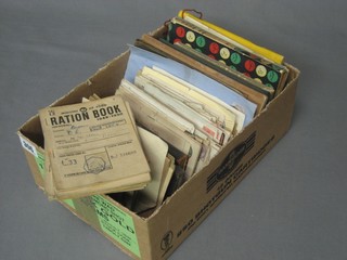 A collection of ration books, stamped envelopes, pamphlets etc