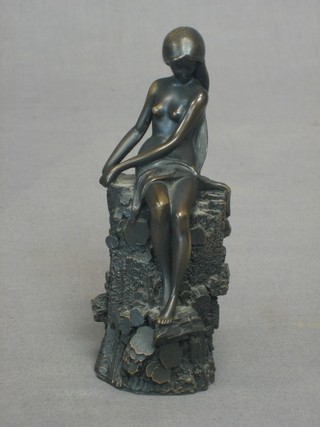 Siovanni Choeman, a bronze figure of a seated semi-naked girl 6", base marked 76 