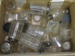 A collection of glass condiment bottles, travelling vanity case bottles etc