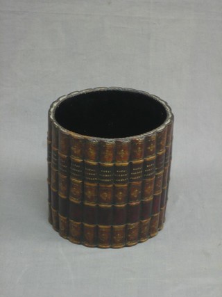 A waste paper bin in the form of leather bound books 9"