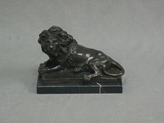 A bronze figure of a seated lion 12"