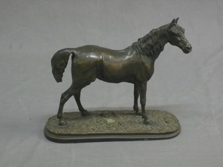 A bronzed figure of a standing horse 13"