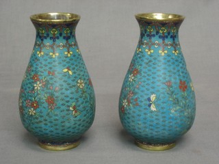 A pair of Japanese blue ground cloisonne vases of club form 6"