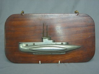 An interesting aluminium brass and teak wall plaque decorated a submarine 15"