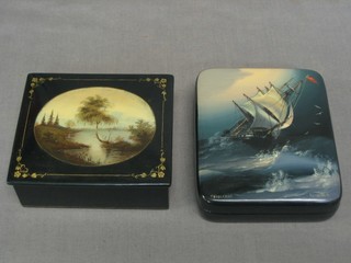 A 20th Century Russian lacquered box with hinged lid decorated a galleon and signed Pedocknho 4" and 1 other decorated a landscape 4"