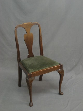 A Queen Anne style slat back chair