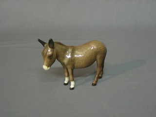 A Beswick figure of a donkey 4"