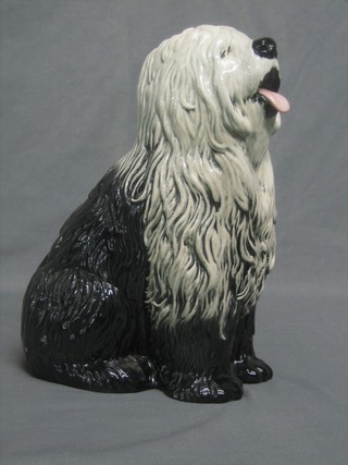 A Beswick figure of a seated Old English Sheep Dog, the base impressed 2232 11"