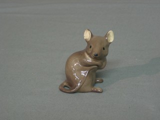 A Beswick figure of a seated mouse 2 1/2"
