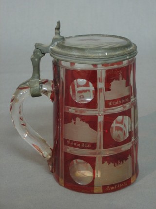 A Bohemian red overlay etched glass stein with hinged lid  5"