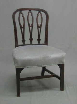 A Georgian mahogany rail back dining chair with upholstered seat, raised on square tapering supports