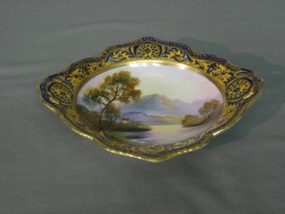 An oval shaped Noritake porcelain dish decorated landscape 8"