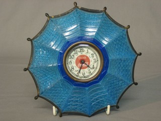 A blue glass Coca Cola advertising clock with enamel dial and Arabic numerals contained in a blue glass case 6"