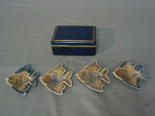 A blue enamelled  cigarette box with hinged lid 4 1/2" containing 4 Wade fish ashtrays