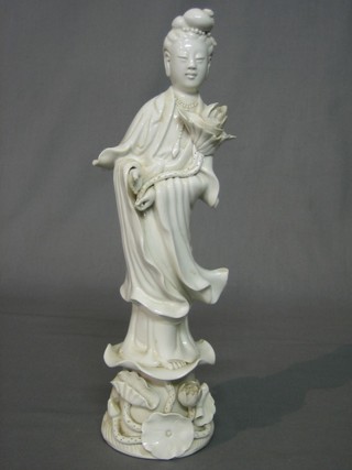 An Oriental blanc de chine figure of a standing Chung Lis (some chips)