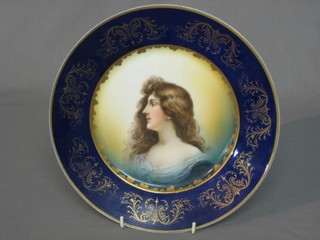 A 19th Century Continental porcelain plate decorated a head and shoulders portrait of a girl 10"