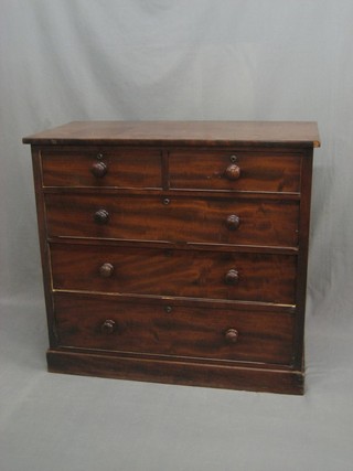 A 19th Century mahogany chest of 2 short and 3 long drawers with tore handles, raised on bracket feet 42"