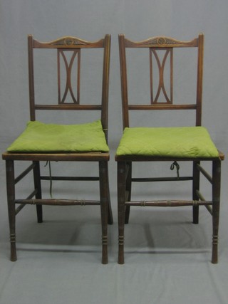 A pair of Victorian walnut bar back bedroom chairs