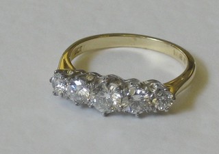A lady's 18ct yellow gold dress/engagement ring set 5 diamonds approx 1.25ct