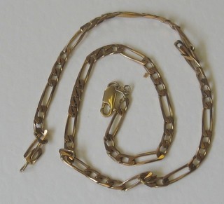 A gilt metal flat link chain