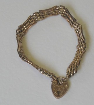 A gilt metal gate bracelet