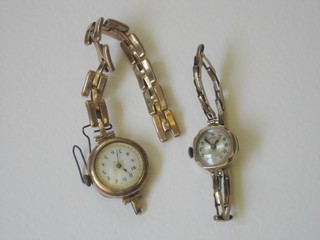 2 lady's gold cased wristwatches