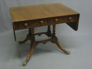 A Victorian mahogany pedestal sofa table fitted 2 drawers, raised on 4 columns with splayed supports 35"