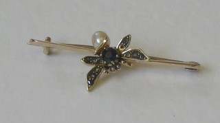 A 15ct gold bar brooch in the form of an insect, the body set a blue stone, the wings set diamond and pearls