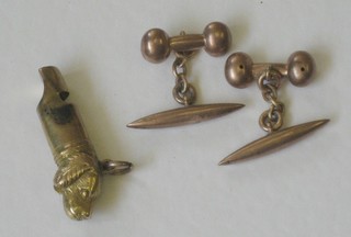 A pair of gilt metal cufflinks together with a gilt metal whistle in the form of a dogs head