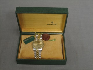 A Rolex Oyster Perpetual date just wristwatch with bi-metal strap (chips to glass), boxed and with papers