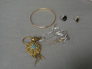 A gilt metal bracelet, a pinch bench beck pendant and a small collection of costume jewellery