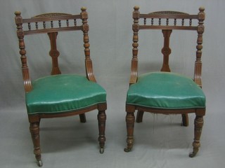 A set of 6 Edwardian carved walnut rail and slat back dining chairs with bobbin turned decoration