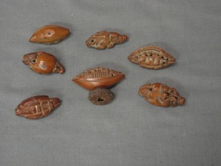 7 carved Eastern figures of boats etc