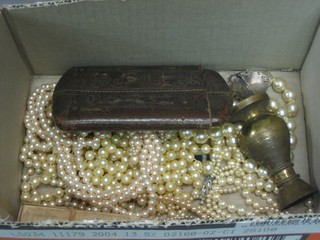 A leather cigar case and a collection of costume jewellery