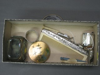 A Victorian rectangular gilt metal and faceted glass trinket box with hinged lid 3", a Stratton compact, a pair of mother of pearl and "silver" mounted napkin rings etc