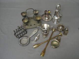 A 4 piece silver plated egg cruet and a collection of silver plated items