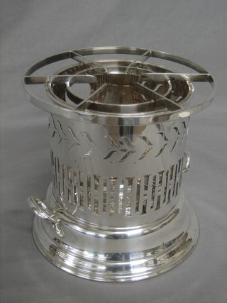 A cylindrical silver plated twin handled flambe stove, base marked Harrods